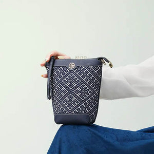 Zhuang Brocade Flying Swallow Motif Embroidered Leather Bucket Crossbody Bag - SinoCultural -- FJ210617